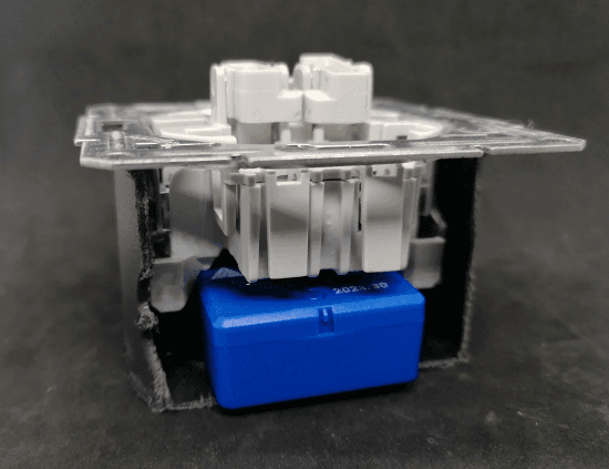 Shelly Plus 1 Mini with switch in a flush-mounted box