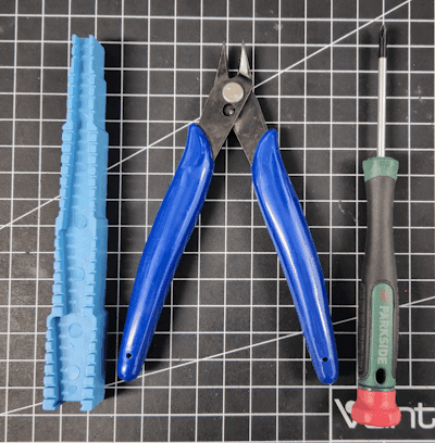 Biegehilfe, Seitenschneider und Kreuzschraubendreher